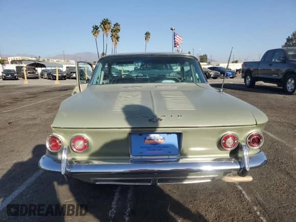 1964 Chevrolet Corvair with VIN 40927W261021, listed as a Copart auction lot 76832294 with 22,768 mi miles and Salvage title. Bid and sale history available at DreamBid. Image 6.