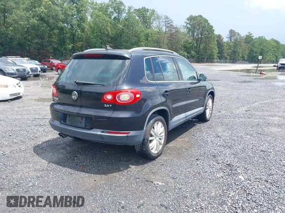 2011 Volkswagen Tiguan S with VIN WVGAV7AX2BW549477, listed as a IAAI auction lot 42923494 with 96,348 mi miles and . Bid and sale history available at DreamBid. Image 4.