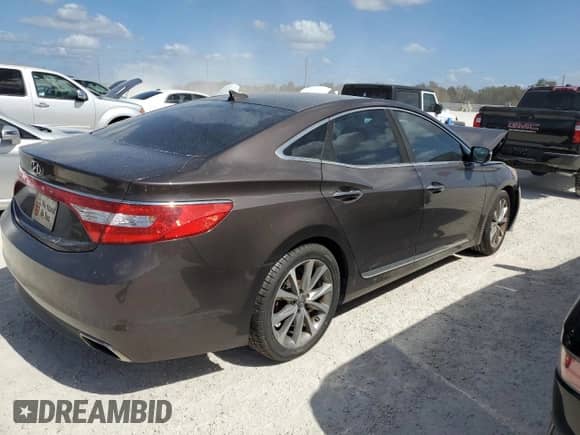 2015 Hyundai Azera с VIN KMHFG4JG2FA490660, выставлен на аукционе Copart как лот 77157344 с пробегом Не указан миль и Списание • Salvage title. История ставок и продаж доступна на DreamBid. Изображение 3.