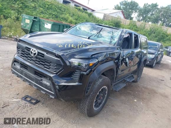 2024 Toyota Tacoma SR5 with VIN 3TMLB5JN4RM054958, listed as a IAAI auction lot 43047601 with 15,429 mi miles and . Bid and sale history available at DreamBid. Image 2.