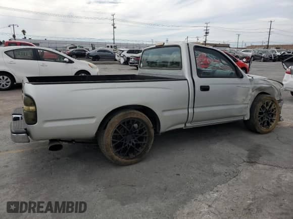 2002 Toyota Tacoma with VIN 5TENL42N82Z080549, listed as a Copart auction lot 80899715 with 115,239 mi miles and Salvage title. Bid and sale history available at DreamBid. Image 3.