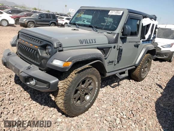 2022 Jeep Wrangler Willys с VIN 1C4GJXAG3NW145649, выставлен на аукционе Copart как лот 69719944 с пробегом 32 757 миль миль и Списание • Salvage title. История ставок и продаж доступна на DreamBid. Изображение 1.
