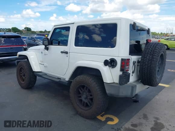 2012 Jeep Wrangler Arctic with VIN 1C4AJWBG2CL229653, listed as a IAAI auction lot 42469581 with 85,293 mi miles and . Bid and sale history available at DreamBid. Image 3.