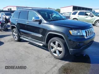 2012 Jeep Grand Cherokee Overland z VIN 1C4RJFCG0CC140536, wystawiony jako IAAI lot #43281273 z przebiegiem 189 472 mil mil oraz . Historia ofert i sprzedaży dostępna na DreamBid. Obrazek 1.