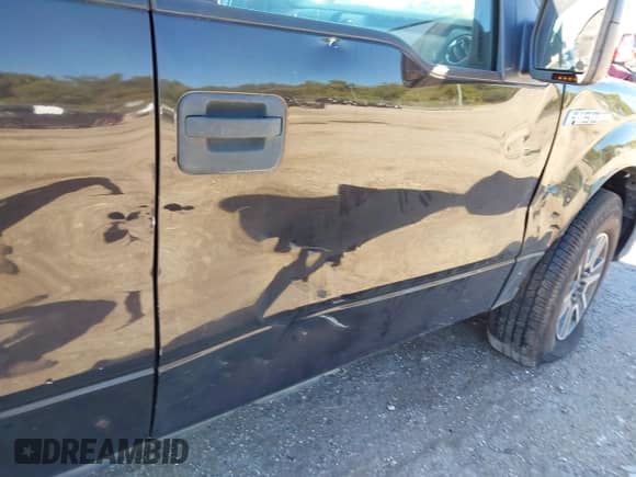 2014 Ford F-150 XLT z VIN 1FTEW1CMXEFA71588, wystawiony jako IAAI lot #43438706 z przebiegiem 254 035 mil mil oraz . Historia ofert i sprzedaży dostępna na DreamBid. Obrazek 17.