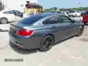 2015 BMW 4 Series 435i xDrive z VIN WBA4B3C54FD669763, wystawiony jako IAAI lot #42962391 z przebiegiem 115 375 mil mil oraz . Historia ofert i sprzedaży dostępna na DreamBid. Obrazek 4.