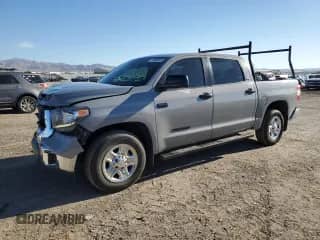 2021 Toyota Tundra SR5 с VIN 5TFEY5F15MX294486, выставлен на аукционе Copart как лот 71932015 с пробегом 63 178 миль миль и Списание • Salvage title. История ставок и продаж доступна на DreamBid. Изображение 1.