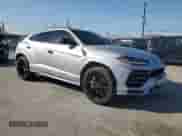 2019 Lamborghini Urus с VIN ZPBUA1ZLXKLA03290, выставлен на аукционе Copart как лот 52026695 с пробегом 20 414 миль миль и Списание • Salvage title. История ставок и продаж доступна на DreamBid. Изображение 4.