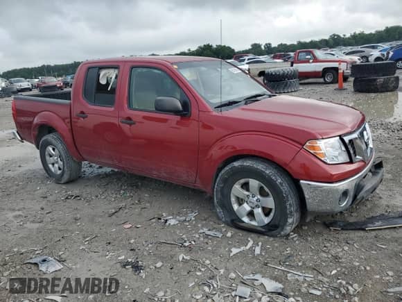 2010 Nissan Frontier SE with VIN 1N6AD0ER9AC434494, listed as a Copart auction lot 65189955 with 88,470 mi miles and Salvage title. Bid and sale history available at DreamBid. Image 4.