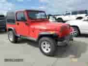 1992 Jeep Wrangler with VIN 2J4FY29S3NJ535736, listed as a Copart auction lot 67747244 with 144,912 mi miles and Salvage title. Bid and sale history available at DreamBid. Image 4.