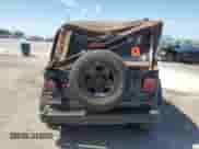 2003 Jeep Wrangler X z VIN 1J4FA39S43P357281, wystawiony jako Copart lot #67979335 z przebiegiem Nie podano mil oraz Szkoda całkowita • Salvage title. Historia ofert i sprzedaży dostępna na DreamBid. Obrazek 6.