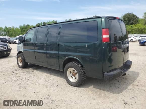 2004 Chevrolet Express Passenger with VIN 1GBFG15T441213195, listed as a Copart auction lot 54150365 with 141,782 mi miles and Clean title. Bid and sale history available at DreamBid. Image 2.