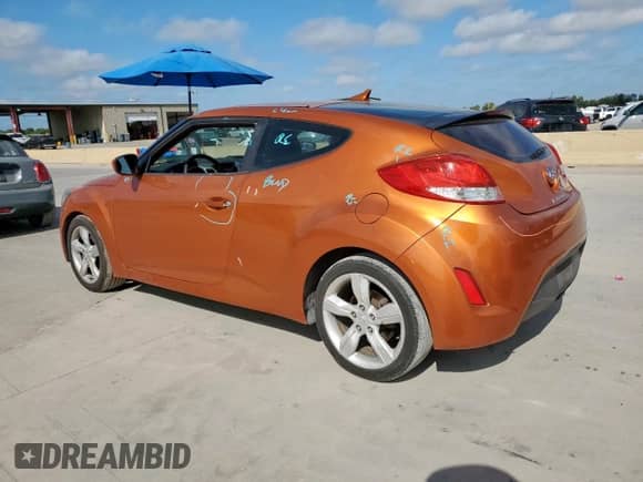 2013 Hyundai Veloster w/Black Int z VIN KMHTC6AD8DU118235, wystawiony jako Copart lot #81145875 z przebiegiem 164 057 mil mil oraz Szkoda całkowita • Salvage title. Historia ofert i sprzedaży dostępna na DreamBid. Obrazek 2.