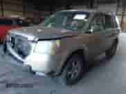 2006 Honda Pilot EX z VIN 5FNYF28466B008439, wystawiony jako IAAI lot #43479400 z przebiegiem 253 015 mil mil oraz . Historia ofert i sprzedaży dostępna na DreamBid. Obrazek 2.