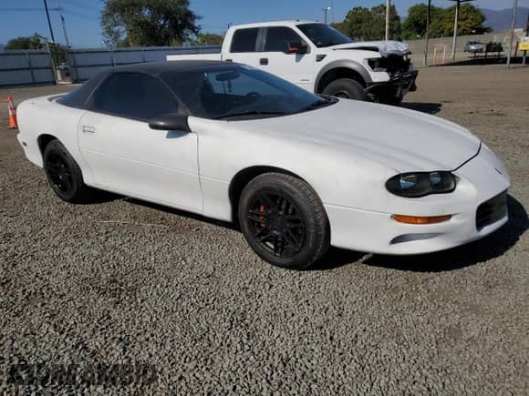 2001 Chevrolet Camaro z VIN 2G1FP22K912103815, wystawiony jako Copart lot #63044275 z przebiegiem 188 572 mil mil oraz Czysty tytuł • Clean title. Historia ofert i sprzedaży dostępna na DreamBid. Obrazek 4.