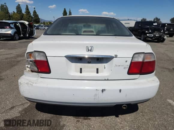 1997 Honda Accord LX with VIN 1HGCD5634VA244155, listed as a Copart auction lot 70736475 with 239,580 mi miles and Salvage title. Bid and sale history available at DreamBid. Image 6.
