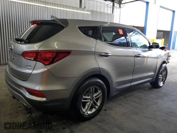 2017 Hyundai Santa Fe 2.4L z VIN 5XYZTDLB0HG403324, wystawiony jako Copart lot #87474755 z przebiegiem 110 919 mil mil oraz Czysty tytuł • Clean title. Historia ofert i sprzedaży dostępna na DreamBid. Obrazek 3.