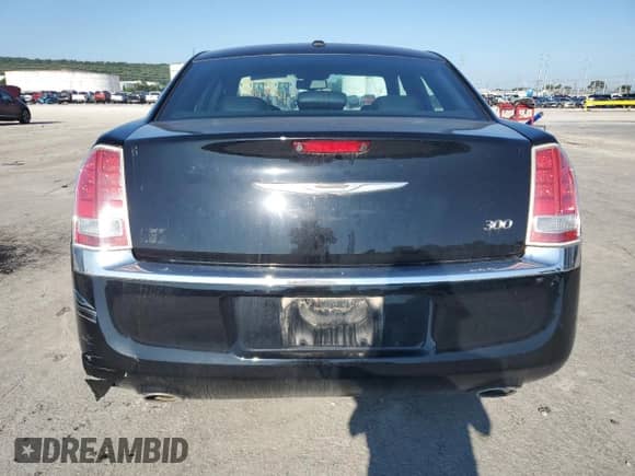 2012 Chrysler 300 Limited z VIN 2C3CCACG2CH242411, wystawiony jako Copart lot #80325775 z przebiegiem 165 492 mil mil oraz Szkoda całkowita • Salvage title. Historia ofert i sprzedaży dostępna na DreamBid. Obrazek 6.