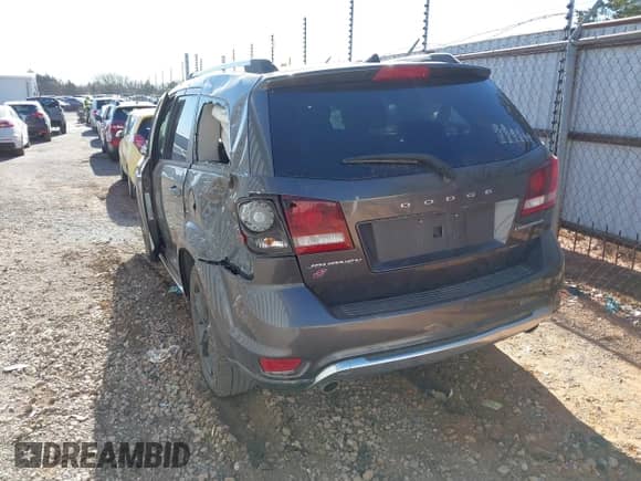 2019 Dodge Journey Crossroad z VIN 3C4PDDGG1KT841067, wystawiony jako IAAI lot #41807185 z przebiegiem 134 725 mil mil oraz . Historia ofert i sprzedaży dostępna na DreamBid. Obrazek 3.