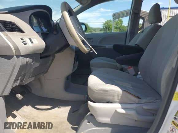 2012 Toyota Sienna with VIN 5TDZK3DC0CS277563, listed as a Copart auction lot 69941375 with 168,806 mi miles and Salvage title. Bid and sale history available at DreamBid. Image 7.