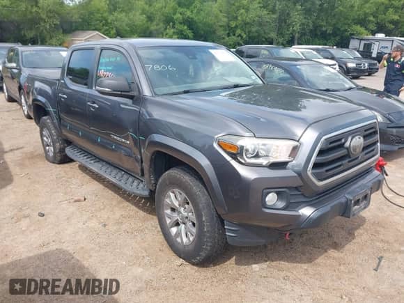 2018 Toyota Tacoma SR5 with VIN 5TFAZ5CN2JX061728, listed as a IAAI auction lot 42775812 with 119,408 mi miles and . Bid and sale history available at DreamBid. Image 1.