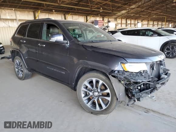 2017 Jeep Grand Cherokee Overland with VIN 1C4RJFCTXHC866490, listed as a Copart auction lot 80149815 with 68,240 mi miles and Salvage title. Bid and sale history available at DreamBid. Image 4.