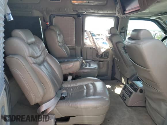 2006 Chevrolet Express Passenger z VIN 1GBFG15T161154772, wystawiony jako Copart lot #51090025 z przebiegiem 114 152 mil mil oraz Szkoda całkowita • Salvage title. Historia ofert i sprzedaży dostępna na DreamBid. Obrazek 11.