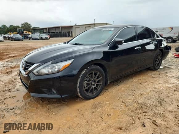 2016 Nissan Altima SR with VIN 1N4AL3AP9GC194745, listed as a Copart auction lot 82051095 with 57,656 mi miles and Salvage title. Bid and sale history available at DreamBid. Image 1.