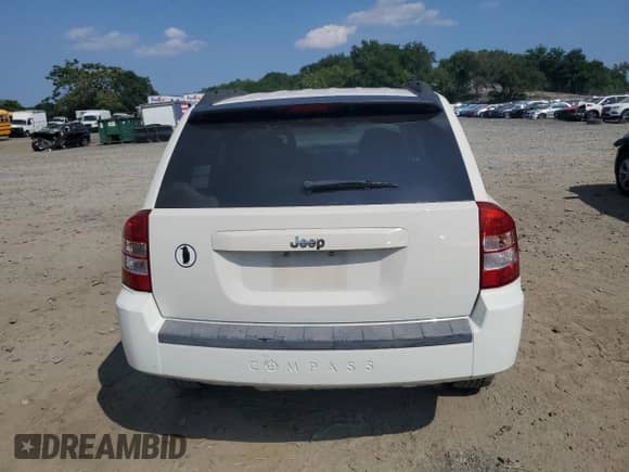 2007 Jeep Compass Sport with VIN 1J8FT47W27D119053, listed as a Copart auction lot 66326715 with 140,065 mi miles and Salvage title. Bid and sale history available at DreamBid. Image 6.