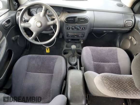 2001 Dodge Neon Highline with VIN 1B3ES46C21D221586, listed as a Copart auction lot 82902094 with 149,474 mi miles and Salvage title. Bid and sale history available at DreamBid. Image 8.