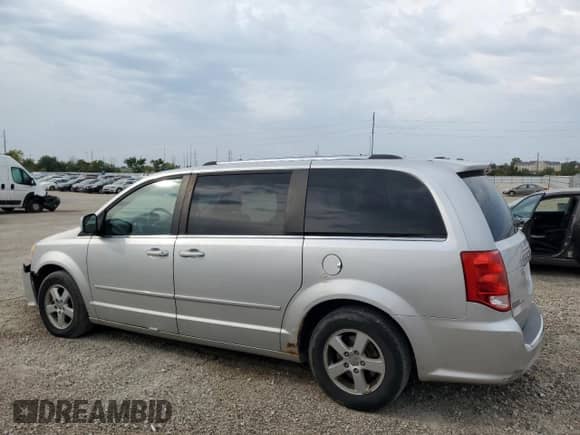2011 Dodge Grand Caravan Crew with VIN 2D4RN5DG6BR689258, listed as a Copart auction lot 80556795 with 149,320 mi miles and Salvage title. Bid and sale history available at DreamBid. Image 2.