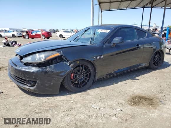 2008 Hyundai Tiburon GT с VIN KMHHN66F18U295838, выставлен на аукционе Copart как лот 51972325 с пробегом 147 626 миль миль и Списание • Salvage title. История ставок и продаж доступна на DreamBid. Изображение 1.