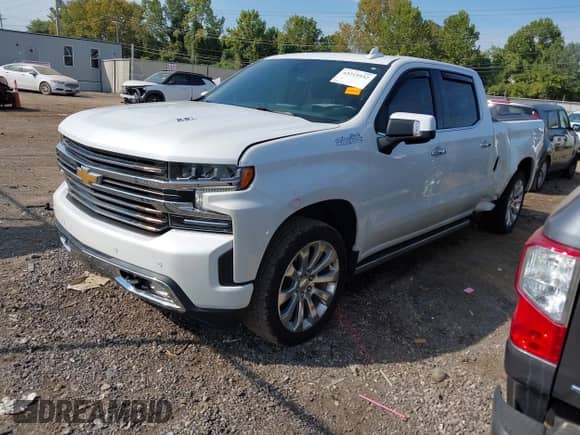 2021 Chevrolet Silverado 1500 High Country with VIN 1GCUYHEL3MZ272071, listed as a IAAI auction lot 43215932 with 113,190 mi miles and . Bid and sale history available at DreamBid. Image 2.