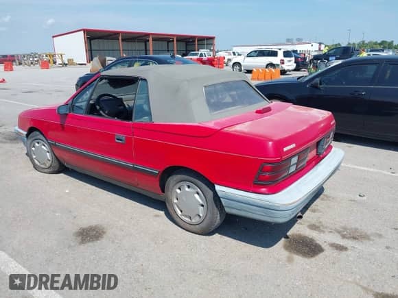 1991 Dodge Shadow with VIN 3B3XP45K8MT603753, listed as a IAAI auction lot 42957931 with 130,805 mi miles and . Bid and sale history available at DreamBid. Image 3.