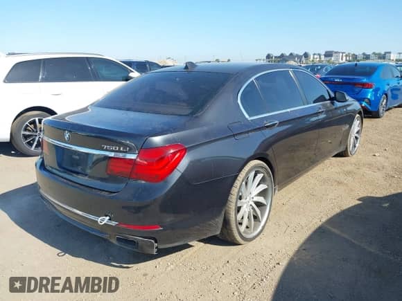 2013 BMW 7 Series 750Li xDrive with VIN WBAYF8C58DD141658, listed as a IAAI auction lot 42327776 with 130,428 mi miles and . Bid and sale history available at DreamBid. Image 4.