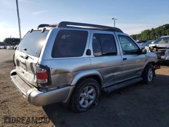 2003 Nissan Pathfinder SE z VIN JN8DR09Y03W809861, wystawiony jako Copart lot #65631275 z przebiegiem 132 716 mil mil oraz Szkoda całkowita • Salvage title. Historia ofert i sprzedaży dostępna na DreamBid. Obrazek 3.