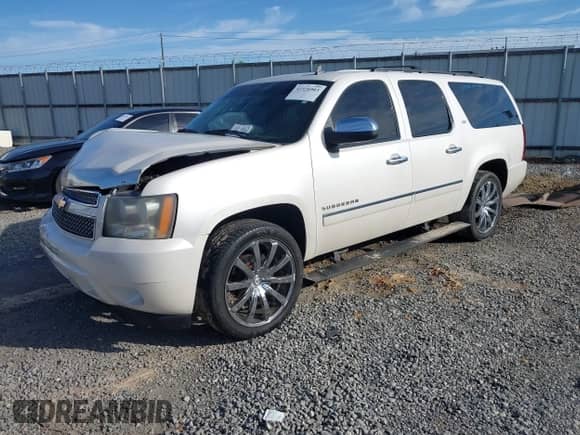 2010 Chevrolet Suburban LTZ z VIN 1GNUCKE00AR176516, wystawiony jako IAAI lot #42326903 z przebiegiem 189 777 mil mil oraz . Historia ofert i sprzedaży dostępna na DreamBid. Obrazek 2.