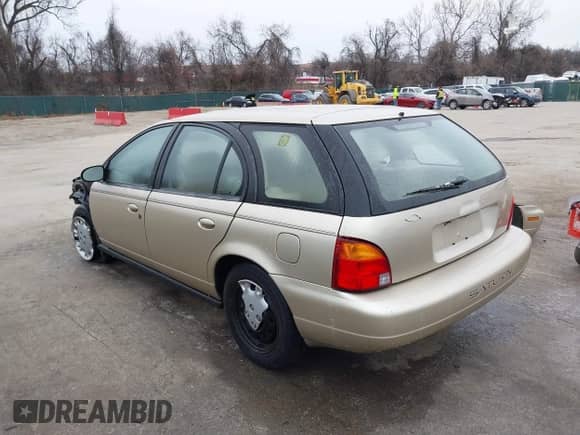 1997 Saturn SW with VIN 1G8ZK8270VZ205793, listed as a IAAI auction lot 41609103 with 120,754 mi miles and . Bid and sale history available at DreamBid. Image 3.