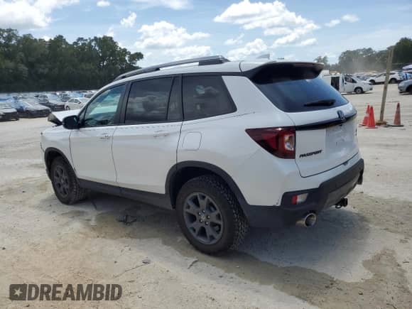 2025 Honda Passport TrailSport with VIN 5FNYF8H69SB009955, listed as a Copart auction lot 67210885 with 13,002 mi miles and Salvage title. Bid and sale history available at DreamBid. Image 2.