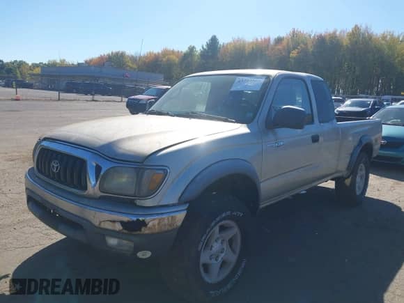 2003 Toyota Tacoma with VIN 5TEWN72N93Z240214, listed as a IAAI auction lot 43393484 with 318,437 mi miles and . Bid and sale history available at DreamBid. Image 2.