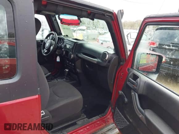 2013 Jeep Wrangler Sport with VIN 1C4AJWAG0DL589698, listed as a IAAI auction lot 41681909 with 80,241 mi miles and . Bid and sale history available at DreamBid. Image 5.