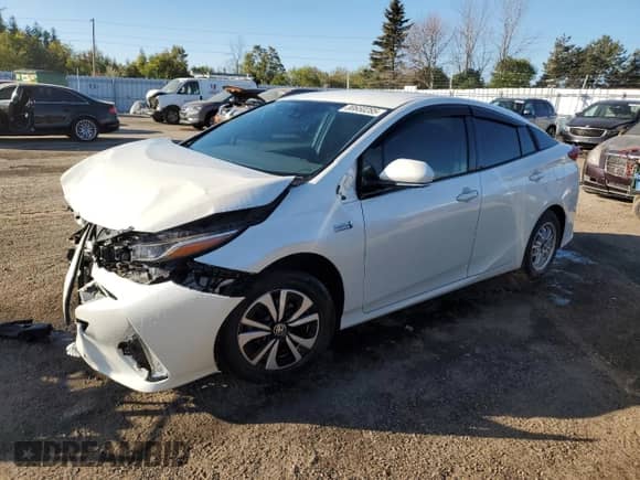 2018 Toyota Prius Plus z VIN JTDKARFP0J3079152, wystawiony jako Copart lot #80650285 z przebiegiem 77 519 mil mil oraz Szkoda całkowita • Salvage title. Historia ofert i sprzedaży dostępna na DreamBid. Obrazek 1.