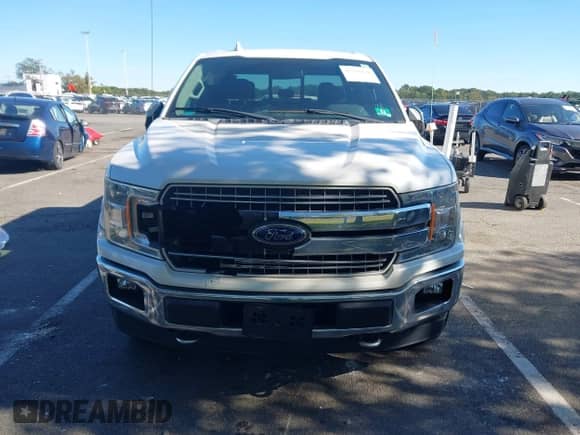 2018 Ford F-150 XL z VIN 1FTEW1EG7JFC51158, wystawiony jako IAAI lot #43347828 z przebiegiem 65 574 mil mil oraz . Historia ofert i sprzedaży dostępna na DreamBid. Obrazek 12.