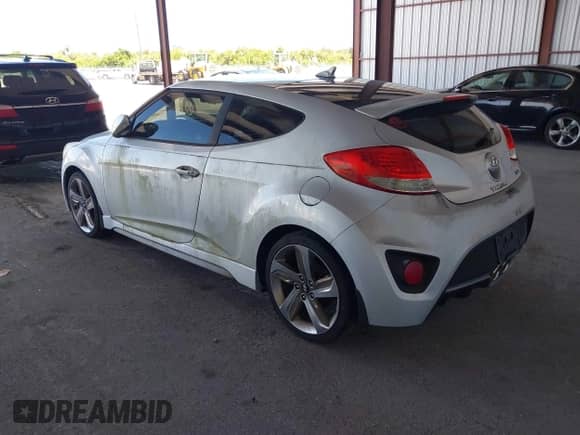 2014 Hyundai Veloster Turbo with VIN KMHTC6AE1EU182840, listed as a IAAI auction lot 43023906 with 56,788 mi miles and . Bid and sale history available at DreamBid. Image 3.