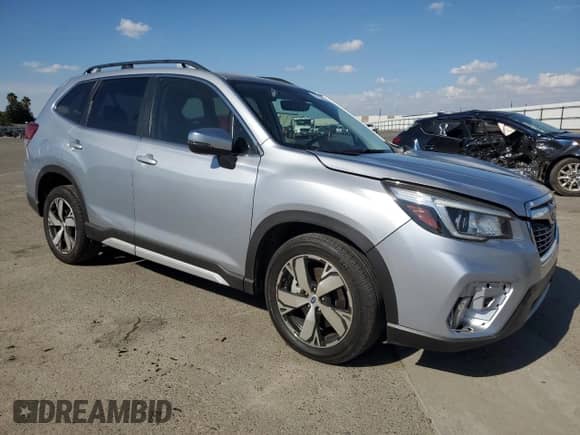 2020 Subaru Forester Touring с VIN JF2SKAXC6LH411340, выставлен на аукционе Copart как лот 81973575 с пробегом 59 048 миль миль и Списание • Salvage title. История ставок и продаж доступна на DreamBid. Изображение 4.
