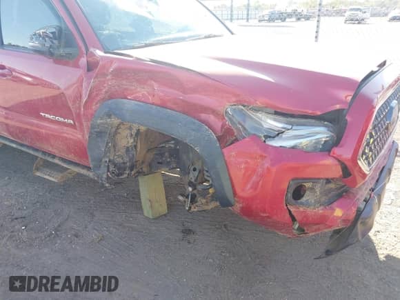 2019 Toyota Tacoma SR5 with VIN 3TMAZ5CNXKM102209, listed as a IAAI auction lot 43392417 with 94,767 mi miles and . Bid and sale history available at DreamBid. Image 6.