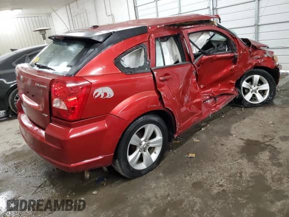 2010 Dodge Caliber SXT с VIN 1B3CB4HA7AD545555, выставлен на аукционе Copart как лот 71230804 с пробегом 168 471 миль миль и На запчасти • Non repairable. История ставок и продаж доступна на DreamBid. Изображение 3.