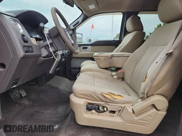 2010 Ford F-150 XL with VIN 1FTFW1EV5AKA48618, listed as a Copart auction lot 86102125 with 189,057 mi miles and Salvage title. Bid and sale history available at DreamBid. Image 7.