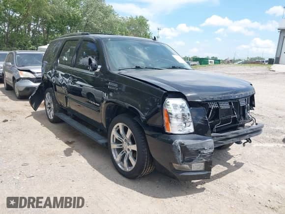 2013 Cadillac Escalade Premium z VIN 1GYS4CEF7DR229735, wystawiony jako IAAI lot #42602998 z przebiegiem 161 595 mil mil oraz . Historia ofert i sprzedaży dostępna na DreamBid. Obrazek 1.