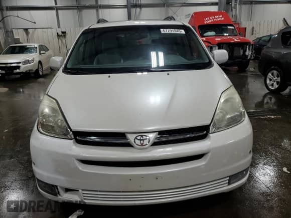 2004 Toyota Sienna XLE z VIN 5TDBA22C54S008865, wystawiony jako Copart lot #67295945 z przebiegiem 276 878 mil mil oraz Szkoda całkowita • Salvage title. Historia ofert i sprzedaży dostępna na DreamBid. Obrazek 5.